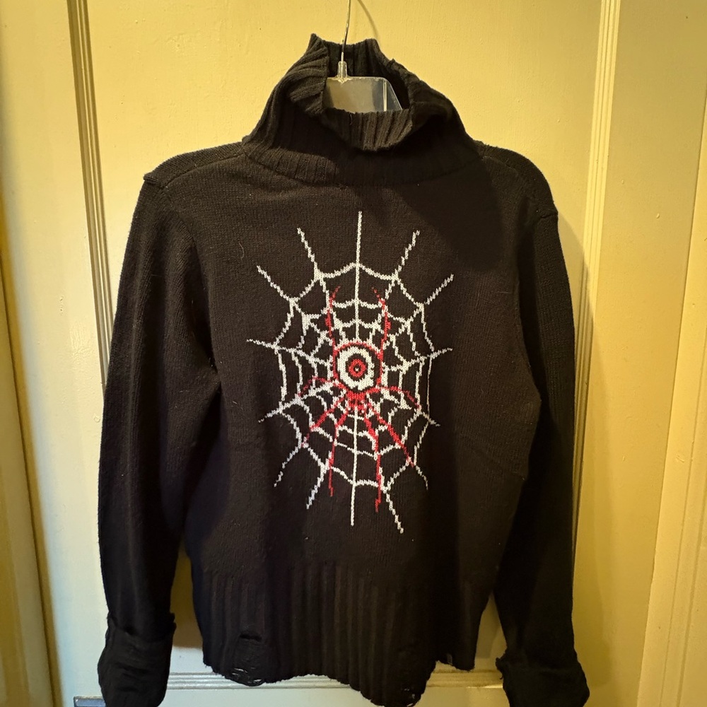 Black Turtleneck Sweater with Spiderweb Graphic